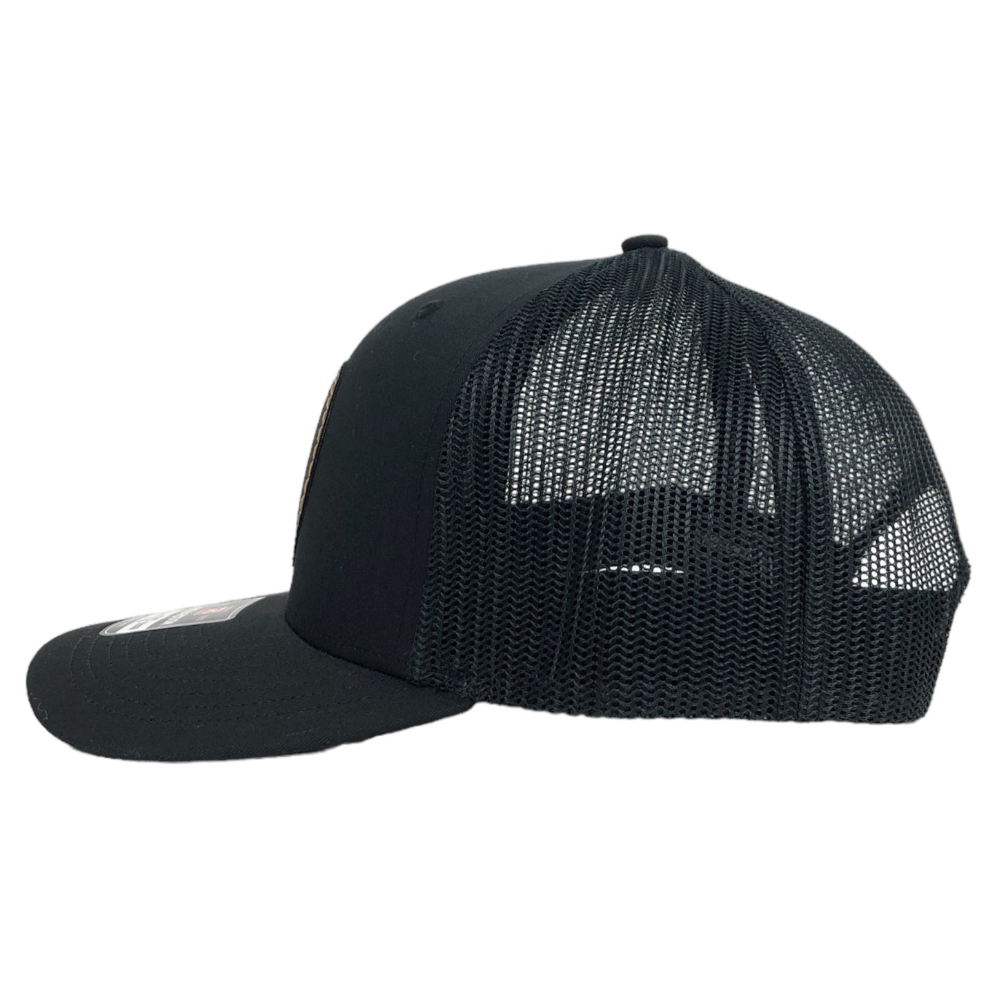 Left side of the DubSea Fish Sticks all black, leather patch, adjustable trucker hat.
